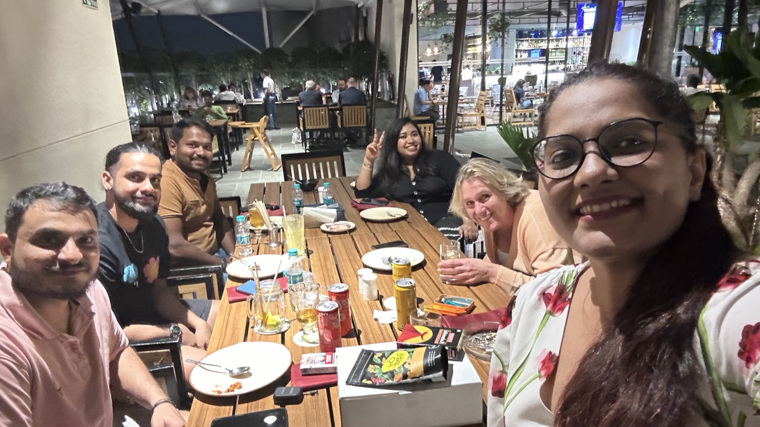 The India team and a European colleague at a team dinner.